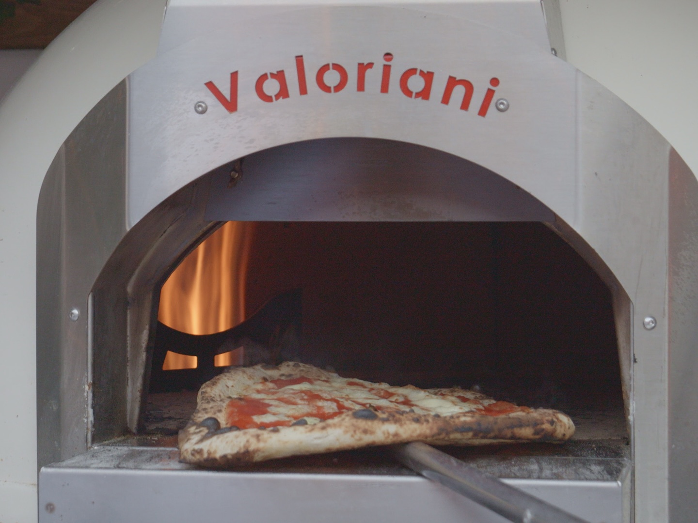 Neapolitan pizza baking in the gas oven